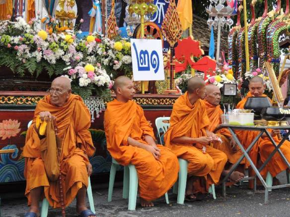 Monks with flowers